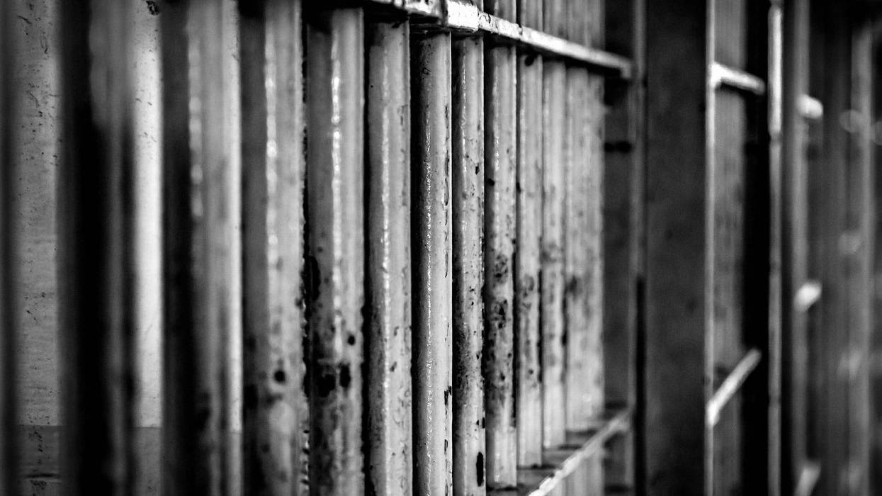 Jail cell bars - stock photo
