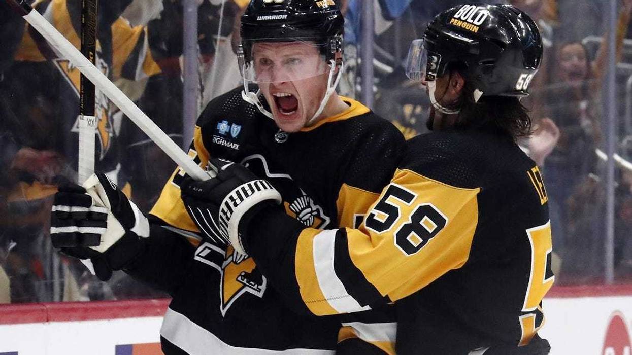 Jake Guentzel celebrates after goal