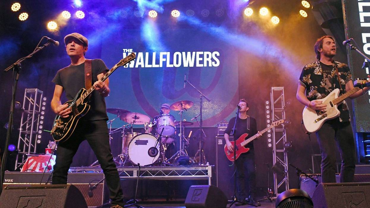 Jakob Dylan of The Wallflowers performs with drummer Lynn Williams, bassist Steve Mackey and guitarist Stanton Adcock at the Fremont Street Experience on August 30, 2019 in Las Vegas, Nevada