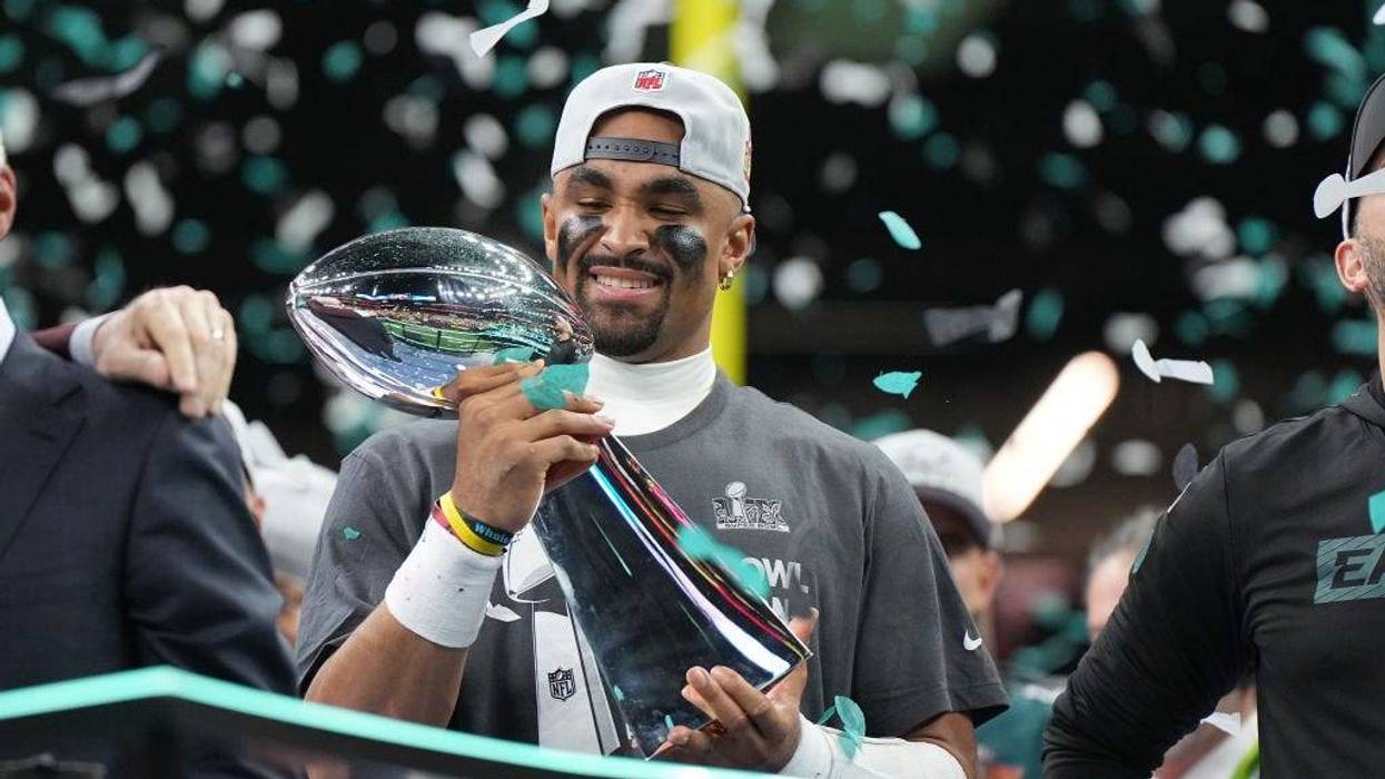 Jalen Hurts holds the Vince Lombardi trophy following victory against the Kansas City Chiefs.