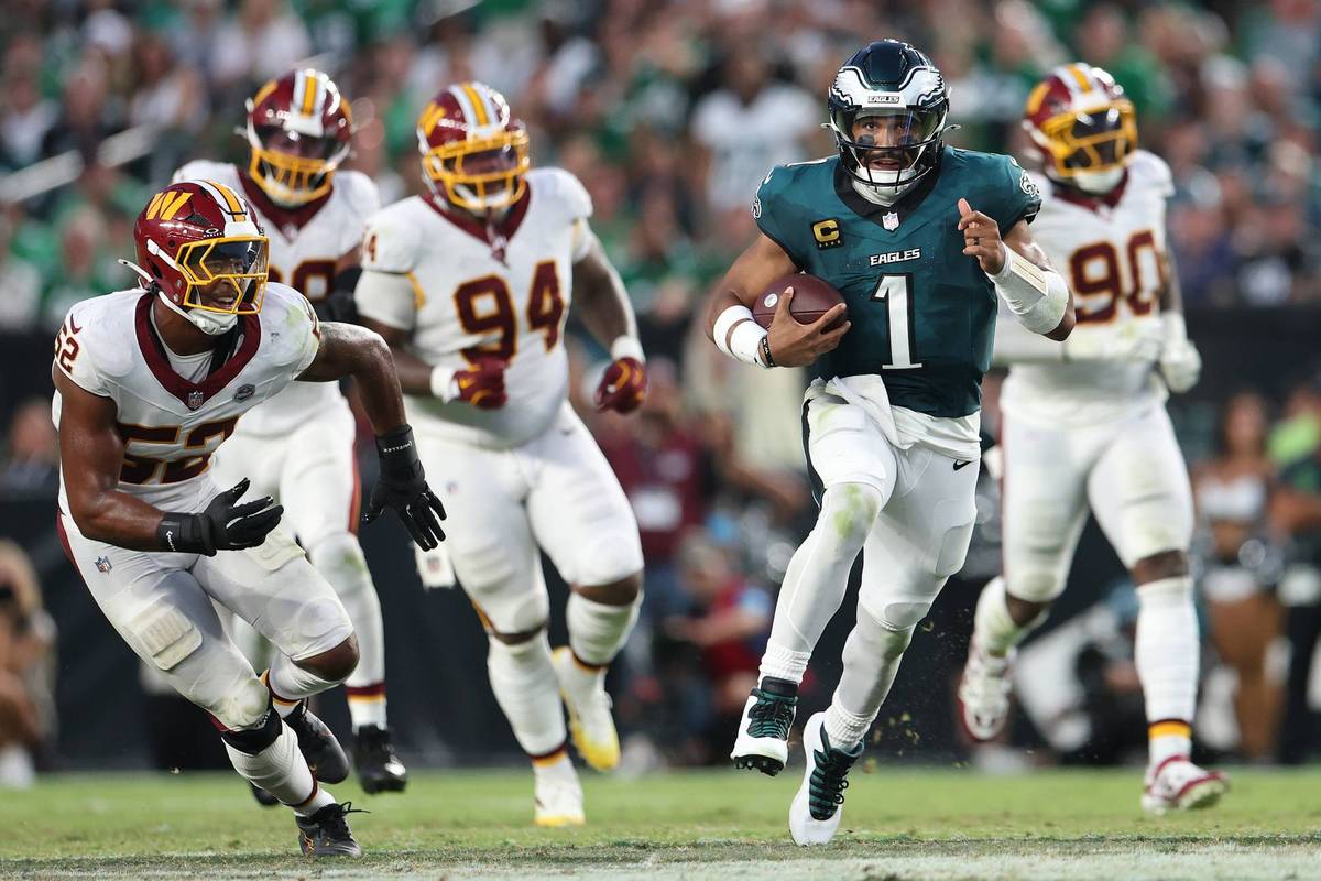 Jalen Hurts scrambles