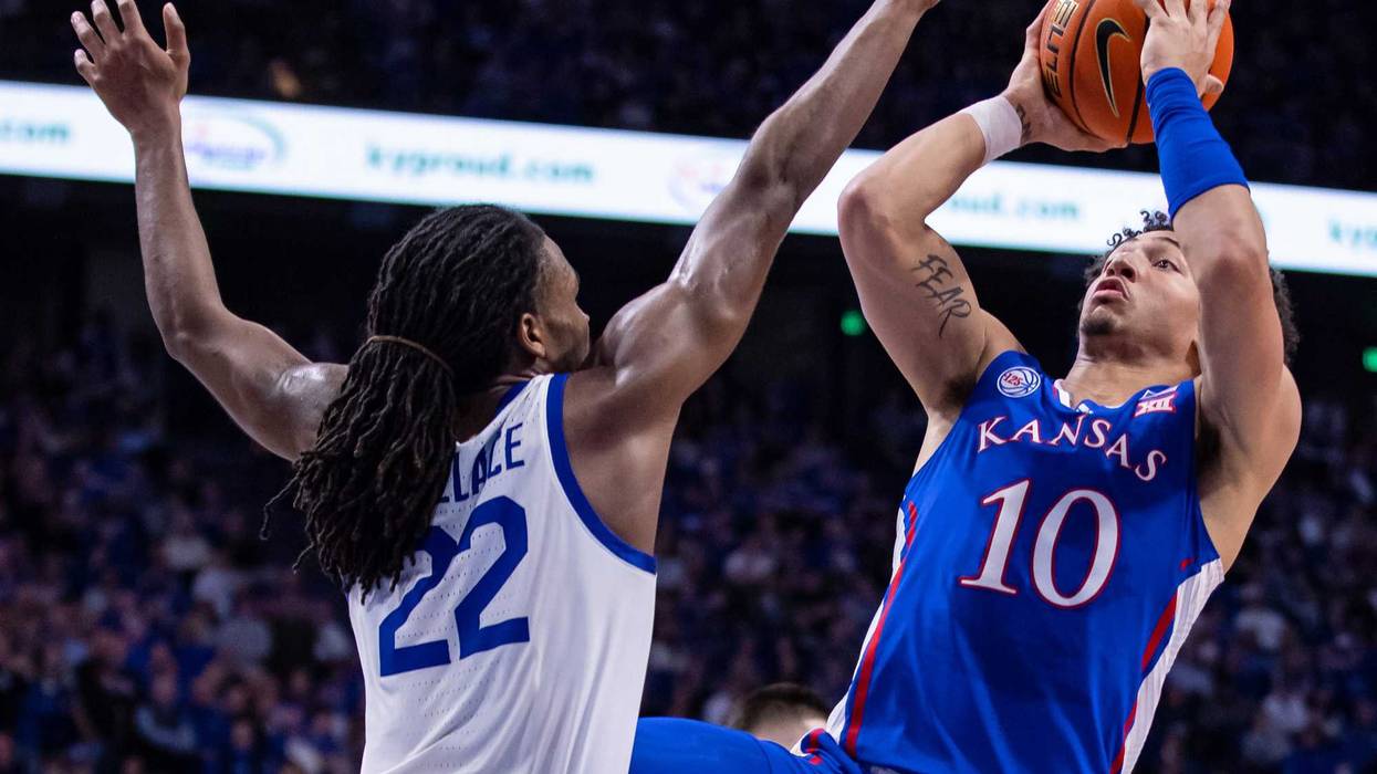 Jalen Wilson #10 of the Kansas Jayhawks shoots the ball against Cason Wallace #22 of the Kentucky Wildcats during the first half at Rupp Arena on January 28, 2023 in Lexington, Kentucky.