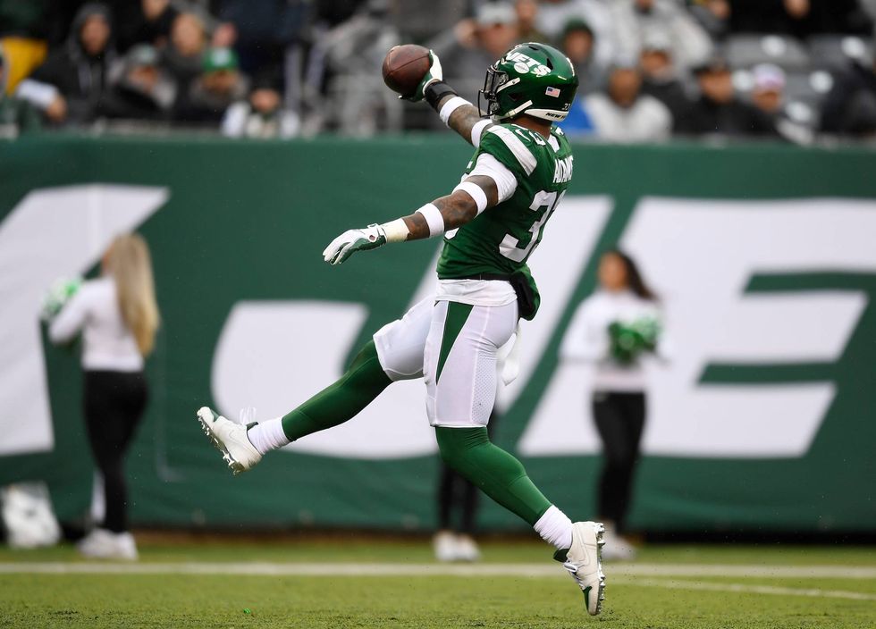 Jamal Adams takes off with the football