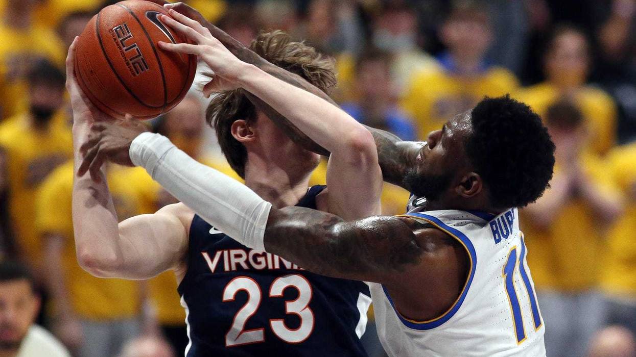 Jamarius Burton fouling Virginia player