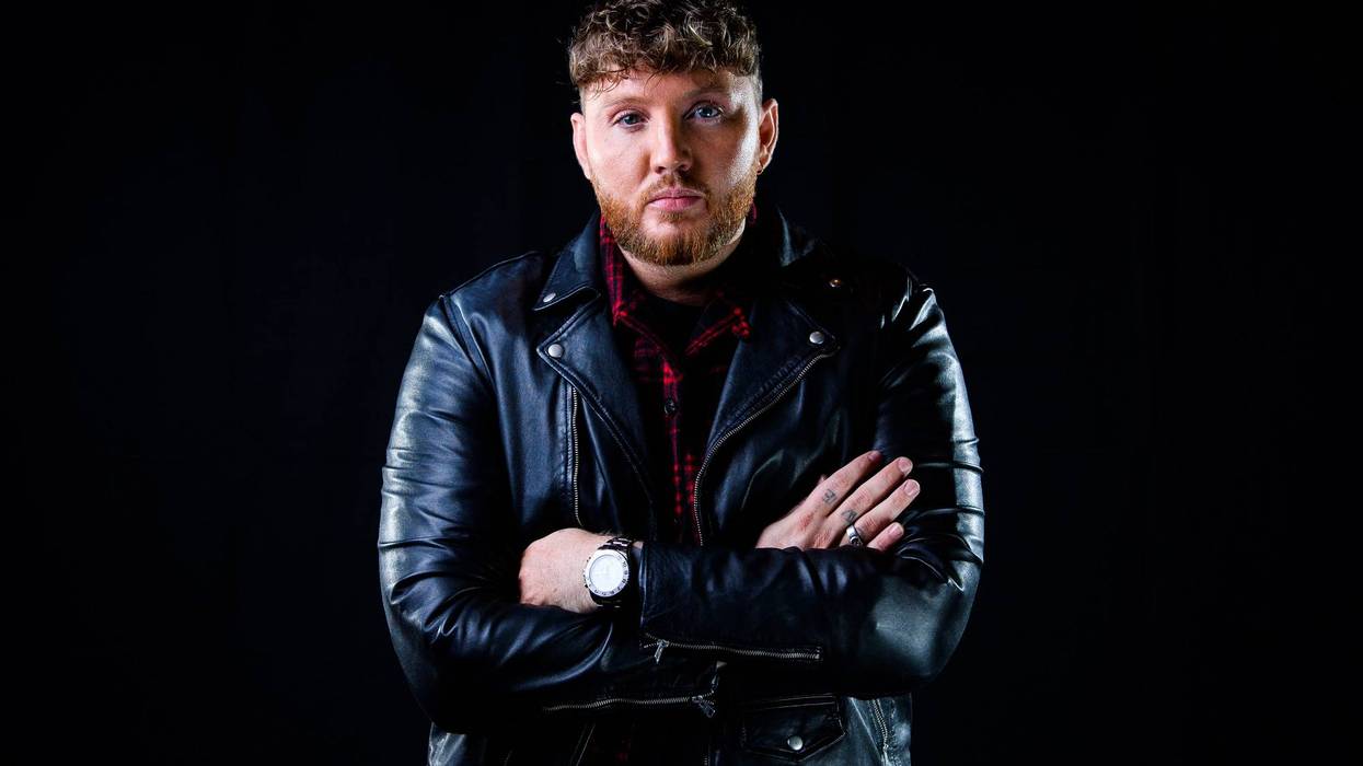 James Arthur folds his arms across his chest