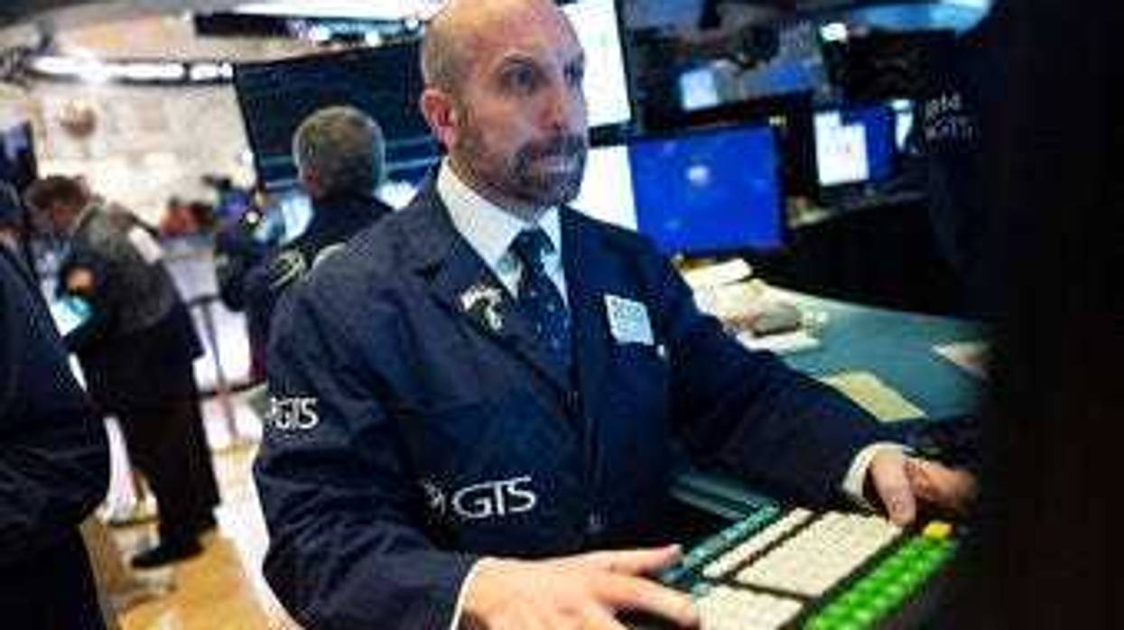 James Denaro monitors stock prices at the New York Stock Exchange, Wednesday, Feb. 26, 2020. (AP Photo/Mark Lennihan)