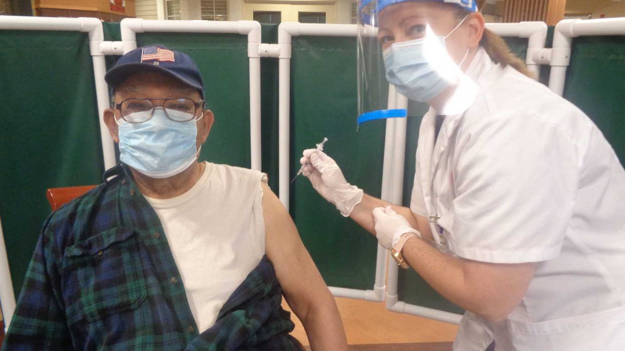 James Ingram received the first coronavirus vaccination administered at Sunny Hill Nursing Home of Will County by a Walgreens employee on Jan. 5. He was one of 158 people vaccinated at the facility.