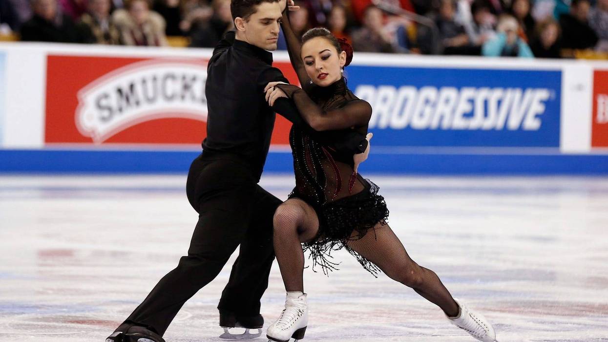 Jan 11, 2014; Boston, MA, USA; Anastasia Olson and Ian Lorello perform during the Free Dance competition at the TD Garden.