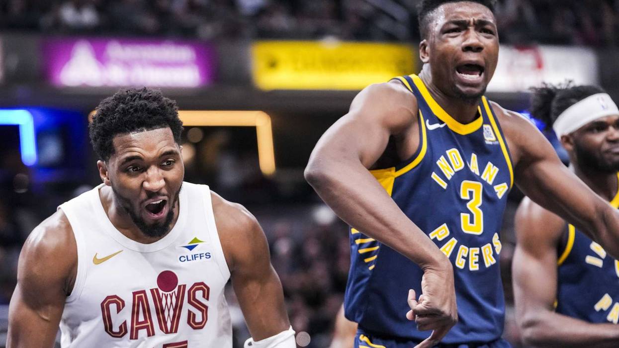 Jan 14, 2025; Indianapolis, IN, USA; Cleveland Cavaliers guard Donovan Mitchell (45) celebrates while Indiana Pacers center Thomas Bryant (3) expresses frustration Tuesday, Jan. 14, 2025, during an NBA game between the Indiana Pacers and the Cleveland Cavaliers at Gainbridge Fieldhouse in Indianapolis. The Cavaliers defeated the Pacers, 127-117.