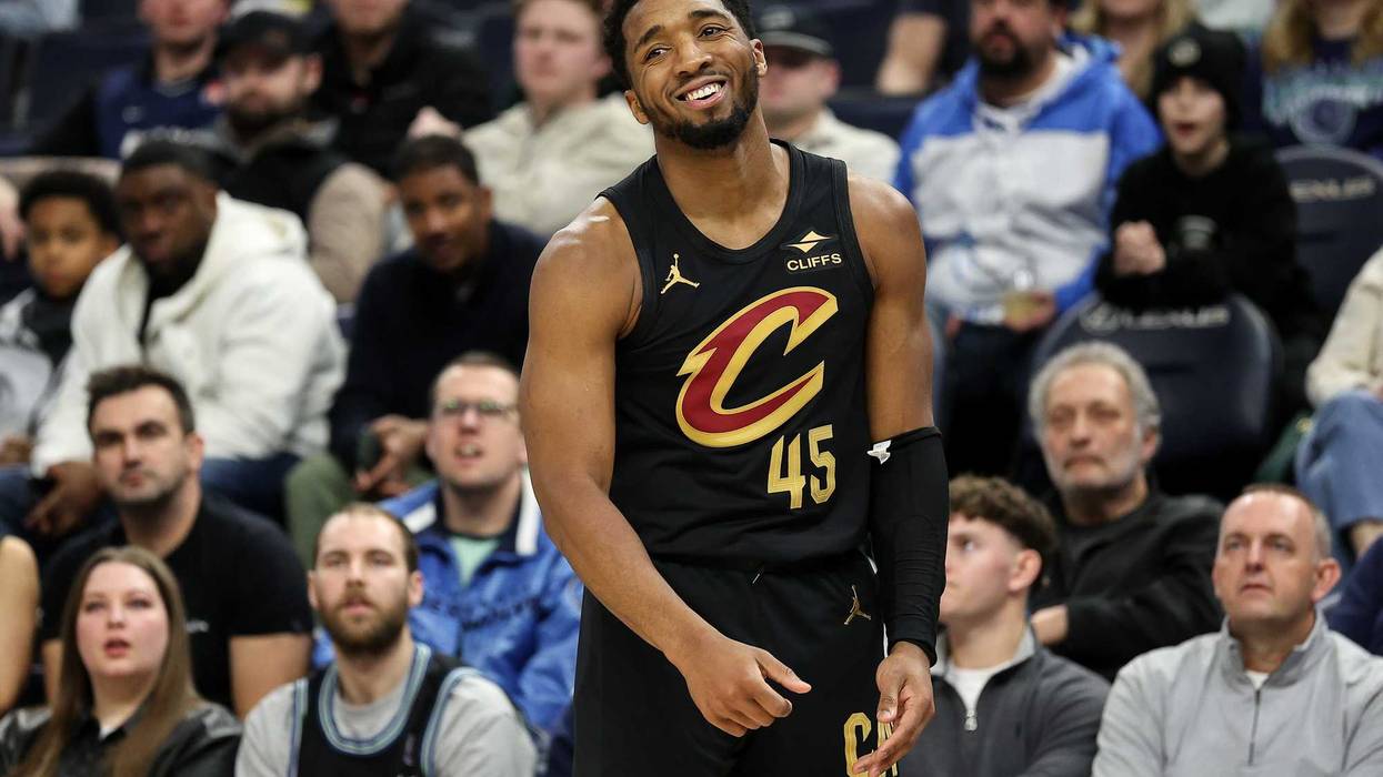 Jan 18, 2025; Minneapolis, Minnesota, USA; Cleveland Cavaliers guard Donovan Mitchell (45) reacts during the fourth quarter against the Minnesota Timberwolves at Target Center.