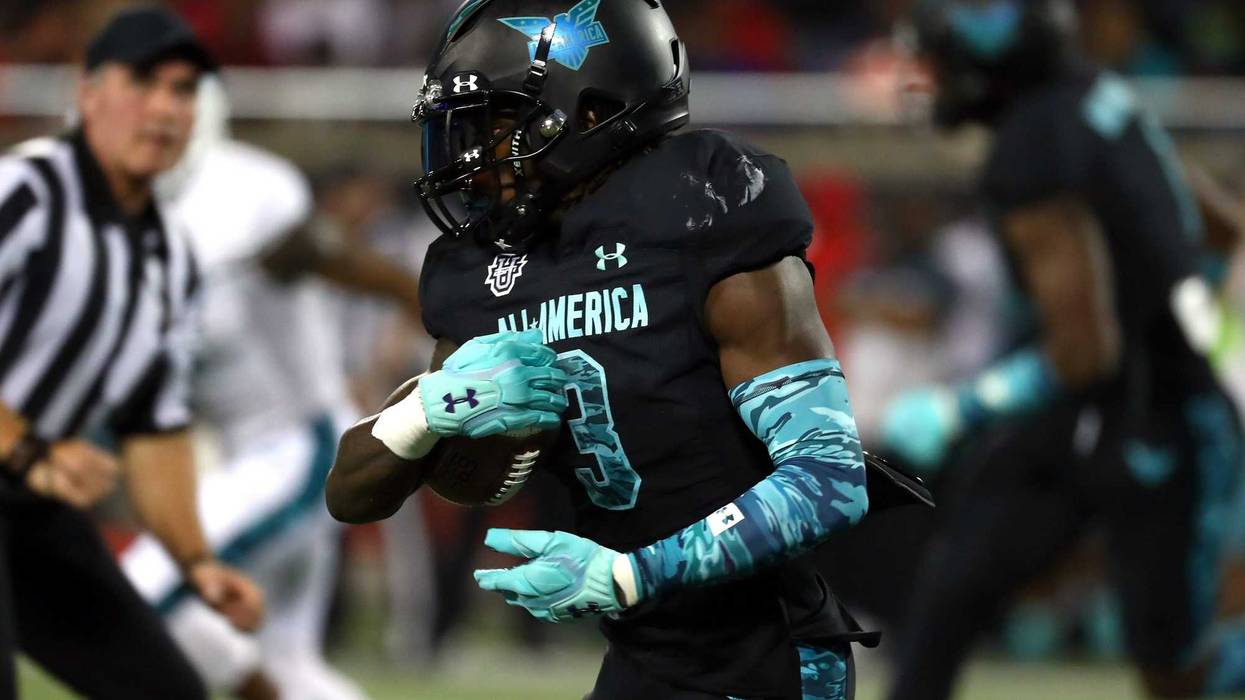 Jan 2, 2020; Orlando, Florida, USA; Team Pressure running back Zachary Evans (3) runs the ball against Team Savage during the first quarter at Camping World Stadium. Mandatory Credit: Kim Klement-USA TODAY Sports