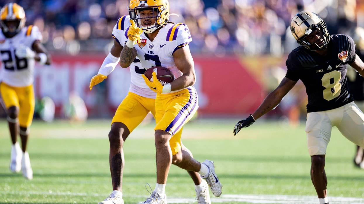 Jan 2, 2023; Orlando, FL, USA; LSU Tigers safety Greg Brooks Jr. (3) gestures after an interception during the second half against the Purdue Boilermakers at Camping World Stadium.