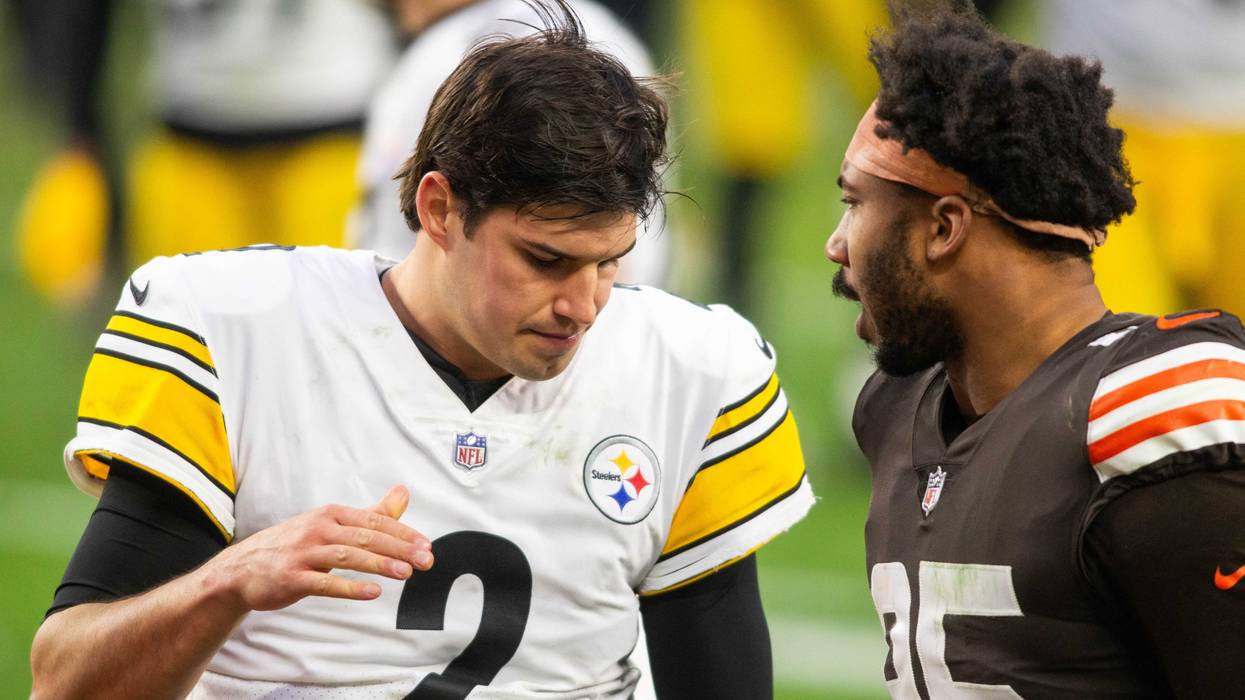 Jan 3, 2021; Cleveland, Ohio, USA; Pittsburgh Steelers quarterback Mason Rudolph (2) talks with Cleveland Browns defensive end Myles Garrett (95) following the game at FirstEnergy Stadium. Mandatory Credit: Scott Galvin-USA TODAY Sports