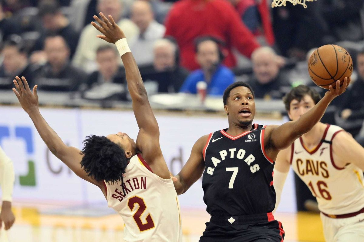 Jan 30, 2020; Cleveland, Ohio, USA; Toronto Raptors guard Kyle Lowry (7) drives against Cleveland Cavaliers guard Collin Sexton (2) in the first quarter at Rocket Mortgage FieldHouse. Mandatory Credit: David Richard-USA TODAY Sports