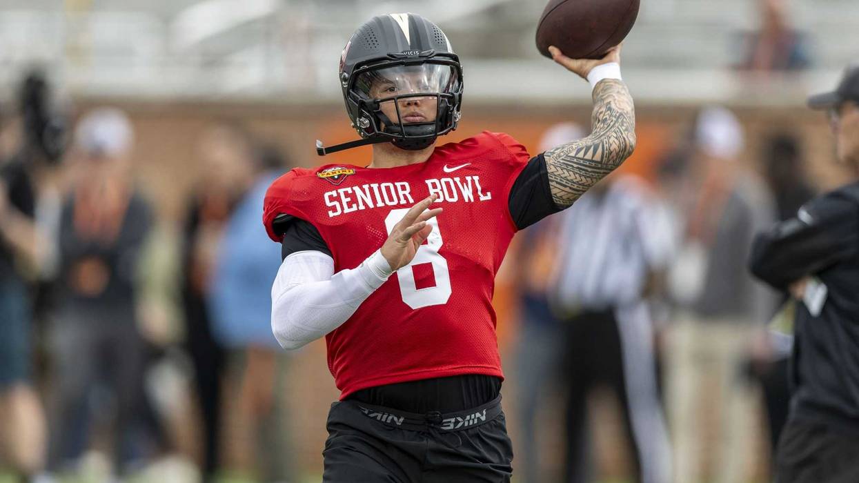 Jan 30, 2025; Mobile, AL, USA; National team quarterback Dillon Gabriel of Oregon (8) works through drills during Senior Bowl practice for the National team at Hancock Whitney Stadium.