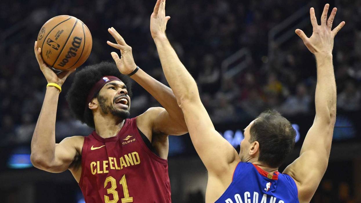 Jan 31, 2024; Cleveland, Ohio, USA; Cleveland Cavaliers center Jarrett Allen (31) shoots against Detroit Pistons forward Bojan Bogdanovic (44) in the second quarter at Rocket Mortgage FieldHouse. Mandatory Credit: David Richard-USA TODAY Sports