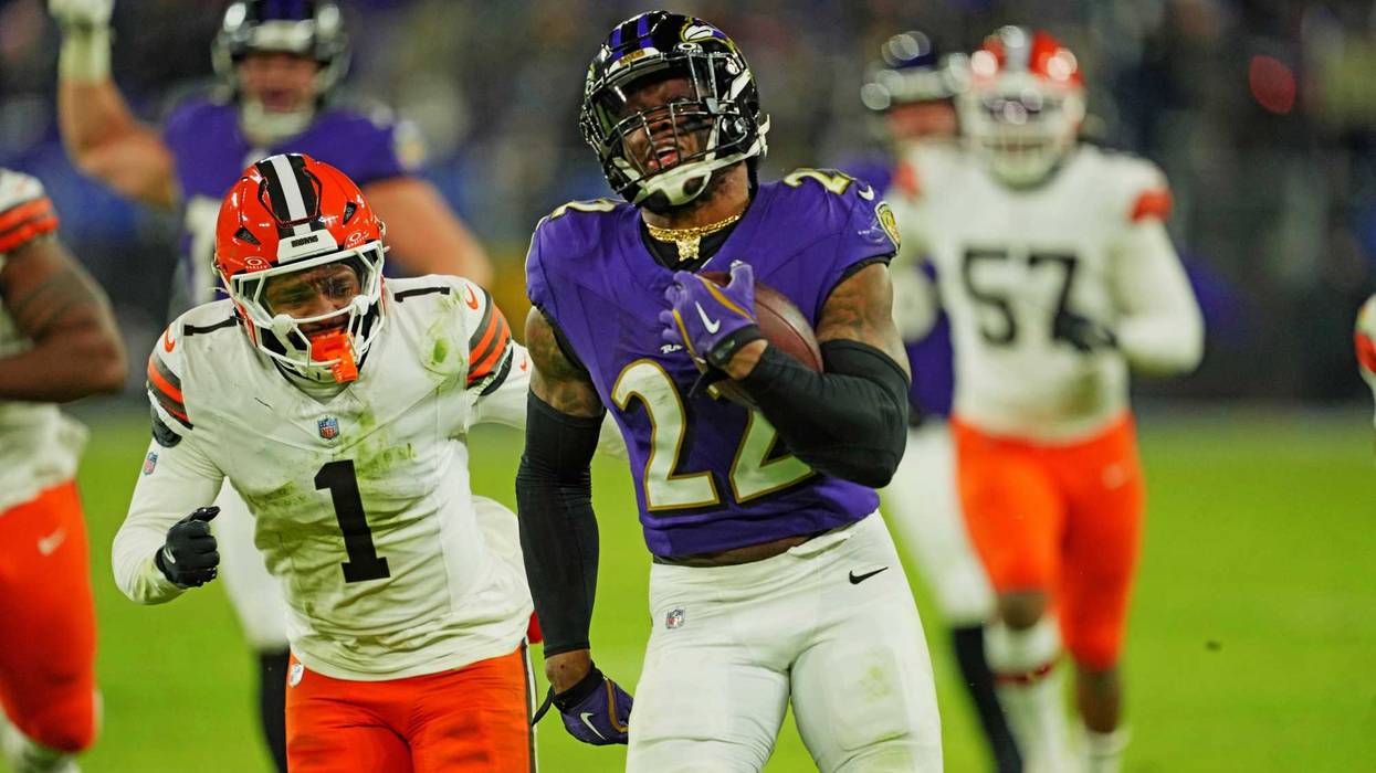 Jan 4, 2025; Baltimore, Maryland, USA; Baltimore Ravens running back Derrick Henry (22) runs for a touchdown during the fourth quarter against the Cleveland Browns at M&T Bank Stadium.