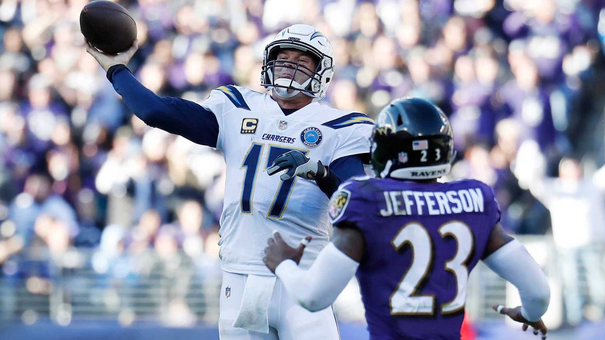 Jan 6, 2019; Los Angeles Chargers quarterback Philip Rivers passes the ball as Baltimore Ravens strong safety Tony Jefferson defends in the second quarter in a AFC Wild Card playoff game at M&T Bank Stadium. Mandatory Credit: Geoff Burke-USA TODAY Sports