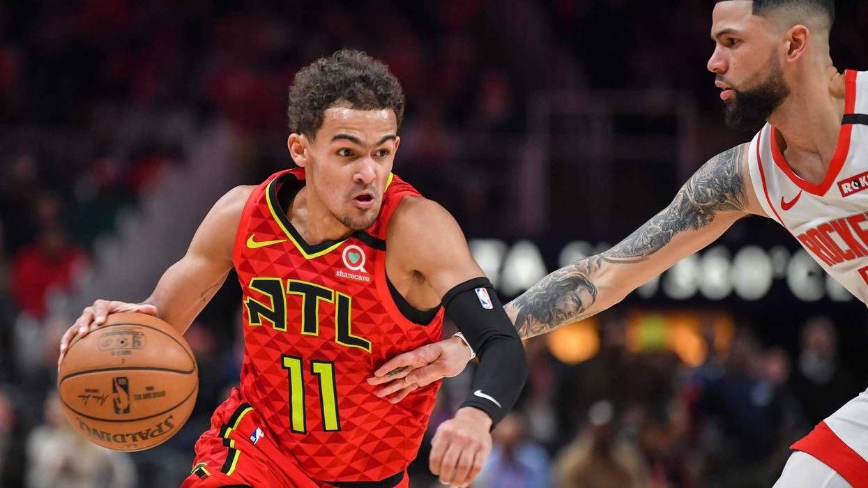 Jan 8, 2020; Atlanta, Georgia, USA; Atlanta Hawks guard Trae Young (11) dribbles defended by Houston Rockets guard Austin Rivers (25) during the second half at State Farm Arena. Mandatory Credit: Dale Zanine-USA TODAY Sports