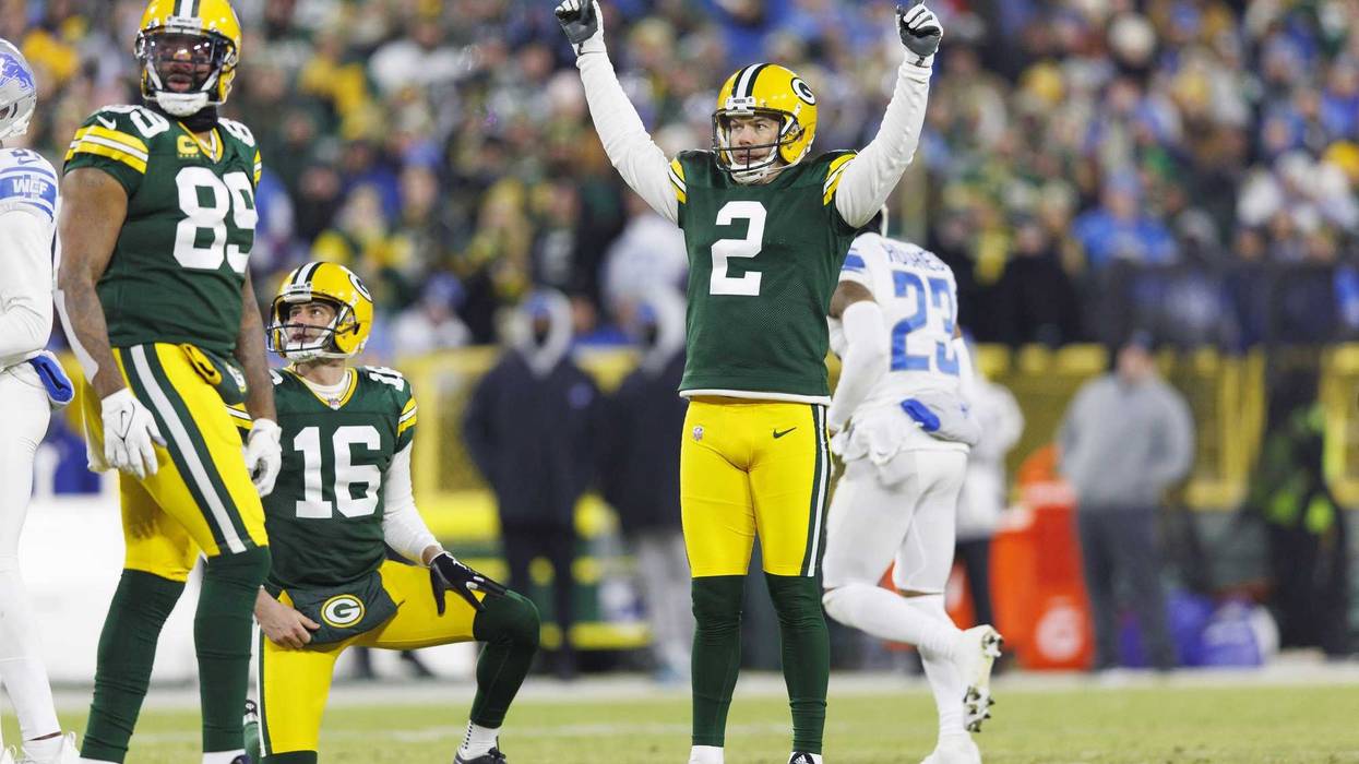 Jan 8, 2023; Green Bay, Wisconsin, USA; Green Bay Packers kicker Mason Crosby (2) celebrates after making a a field goal during the second quarter against the Detroit Lions at Lambeau Field. Mandatory Credit: Jeff Hanisch-Imagn Images