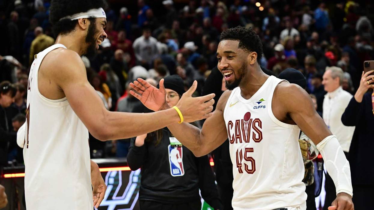 Jan 8, 2025; Cleveland, Ohio, USA; Cleveland Cavaliers guard Donovan Mitchell (45) celebrates with center Jarrett Allen (31) after the Cavaliers beat the Oklahoma City Thunder at Rocket Mortgage FieldHouse. Mandatory Credit: Ken Blaze-Imagn Images