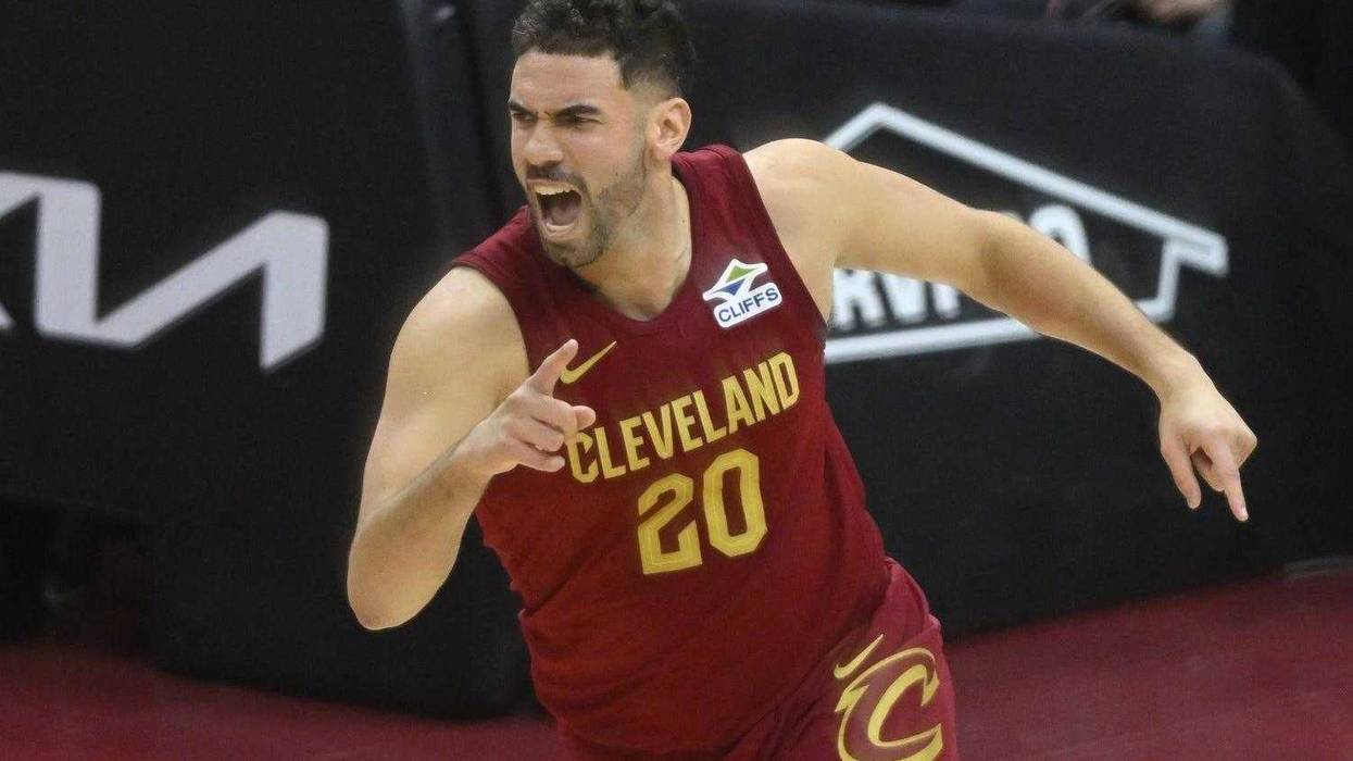 Jan 9, 2025; Cleveland, Ohio, USA; Cleveland Cavaliers forward Georges Niang (20) celebrates his three-point basket in the third quarter against the Toronto Raptors at Rocket Mortgage FieldHouse.