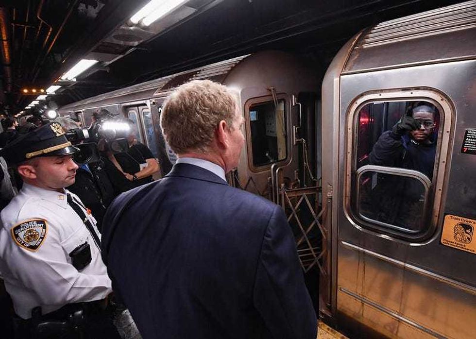 Janno Lieber and 6 train conductor.