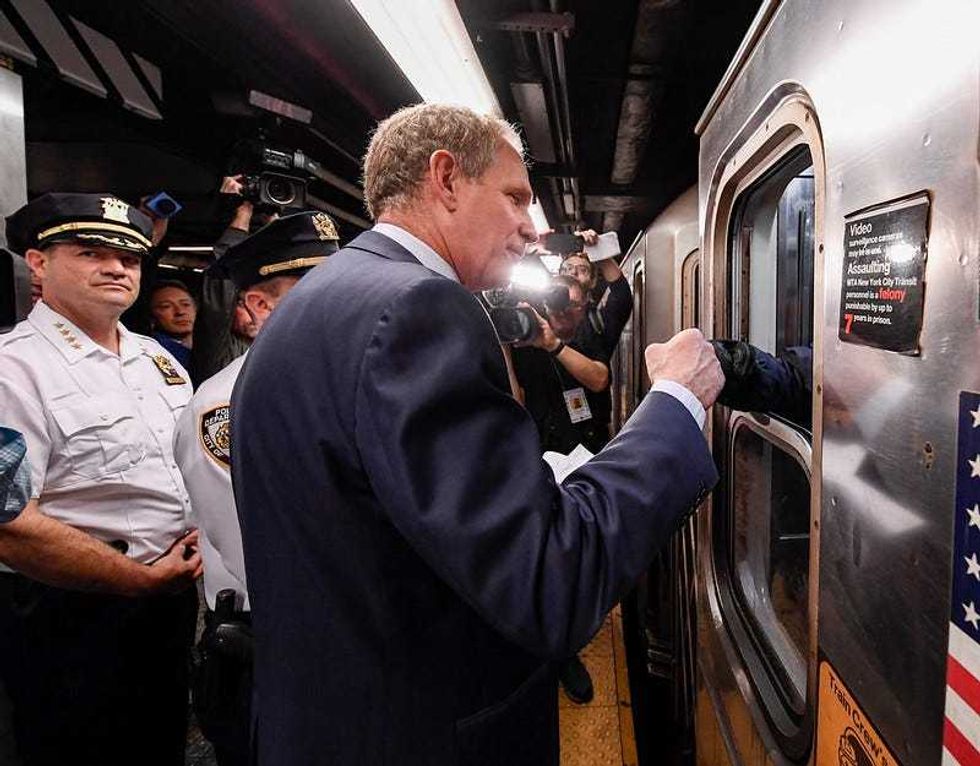 Janno Lieber speaking to 6 train conductor.