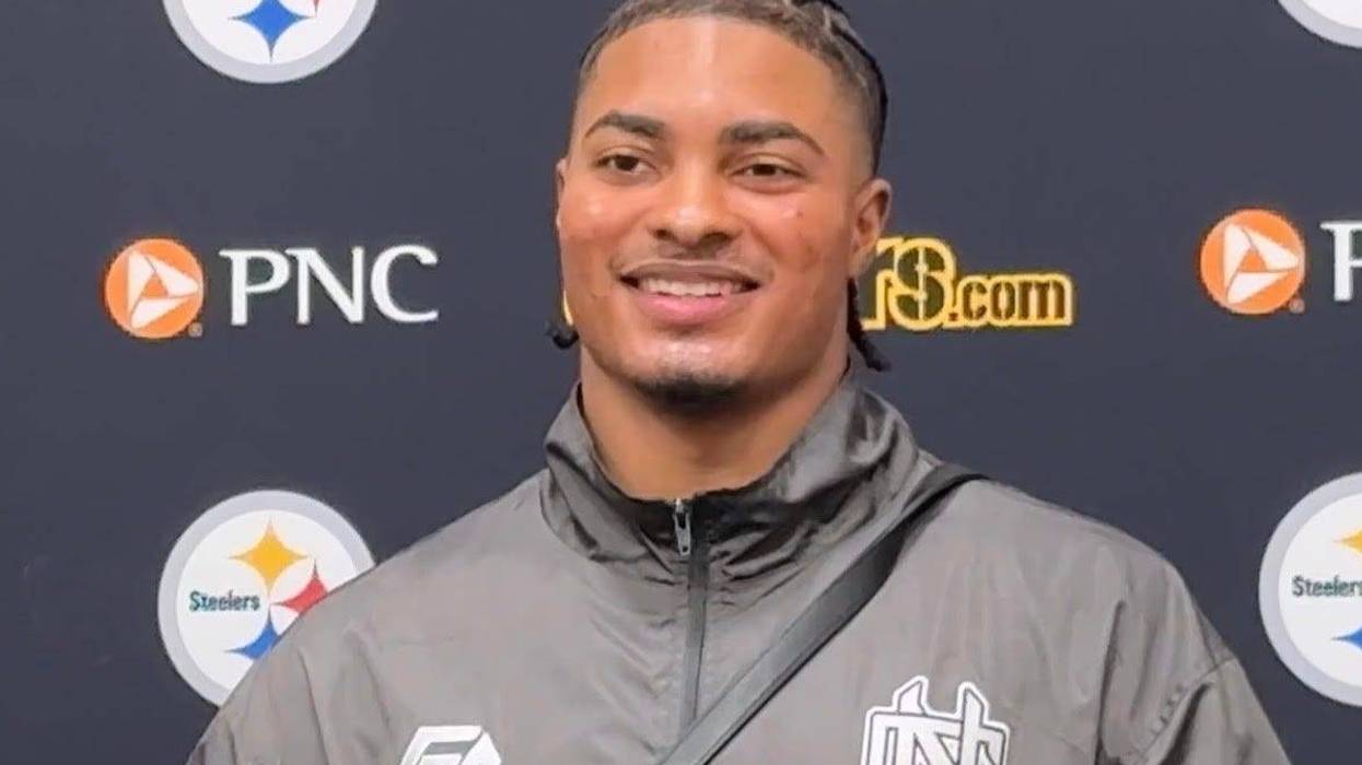 Jaquan Brisker at podium