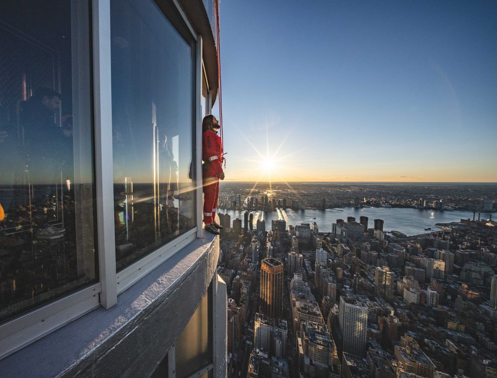 Jared Leto takes in midtown Manhattan on a ledge of the Empire State Building on Nov. 9, 2023, as he climbs the skyscraper.