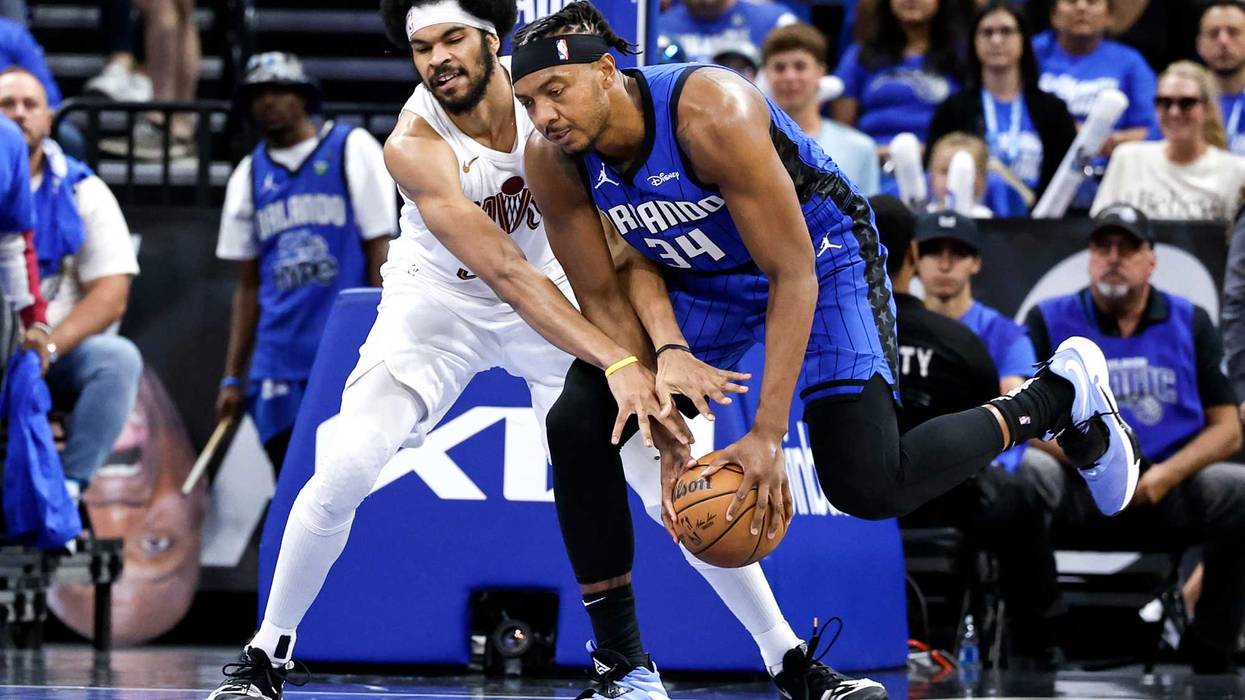 Jarrett Allen #31 of the Cleveland Cavaliers battles for a loose ball with Wendell Carter, Jr. #34 of the Orlando Magic during Game Four of the First Round of the 2024 NBA Eastern Conference Playoffs at the Kia Center on April 27, 2024 in Orlando, Florida. The Magic defeated the Cavaliers 112-89 to tie the series up 2-2.