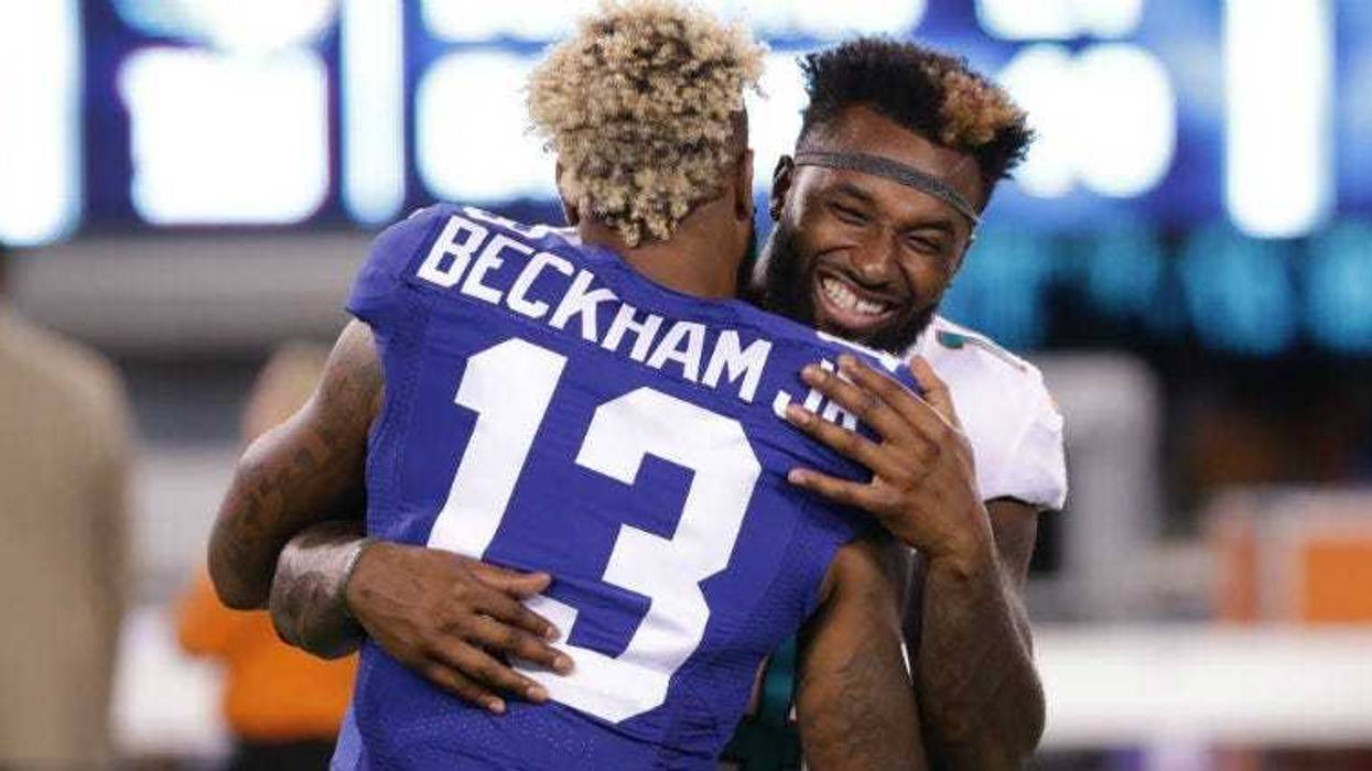 Jarvis Landry embraces Odell Beckham after the preseason game at MetLife Stadium.