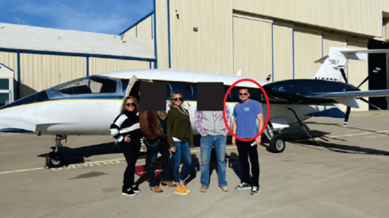 Jason Hyland on right circled in red