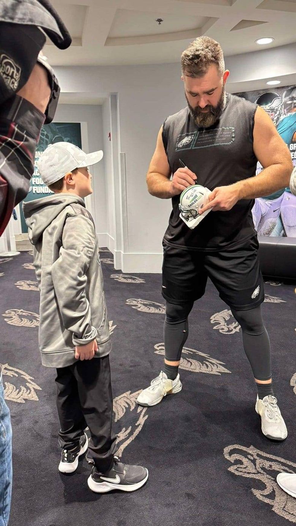 Jason Kelce signing JJ Thompson
