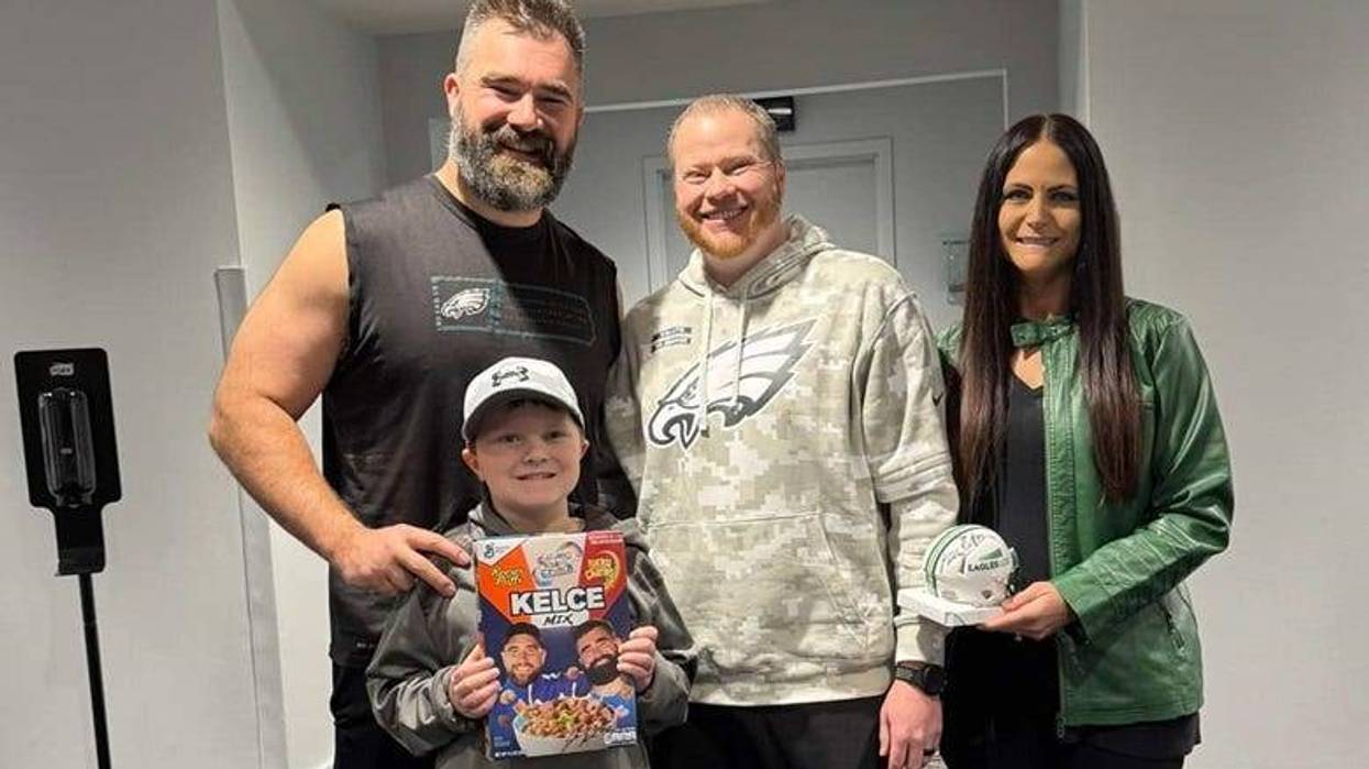 Jason Kelse with the Thompson family