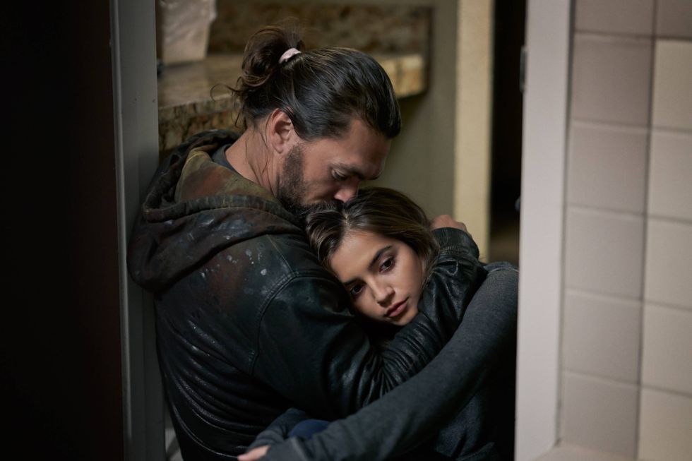 Jason Momoa and Isabela Merced in a production still from