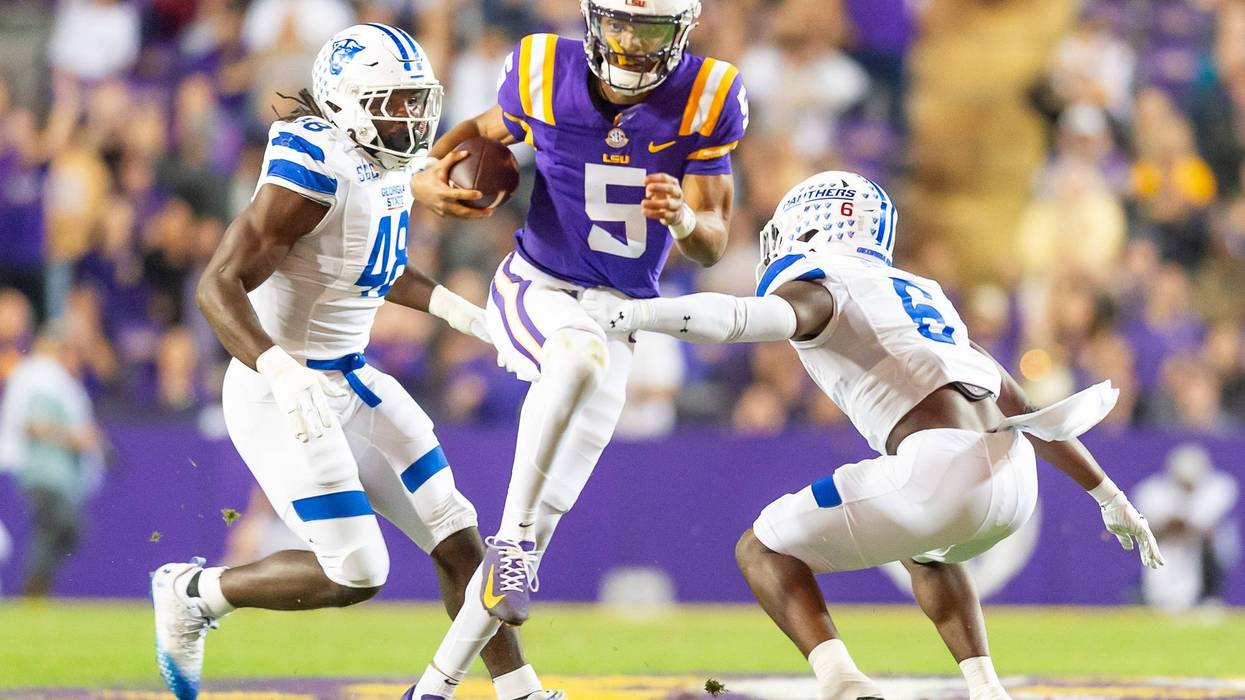 Jayden Daniels 5 runs the ball as the LSU Tigers take on Georgia State in Tiger Stadium in Baton Rouge
