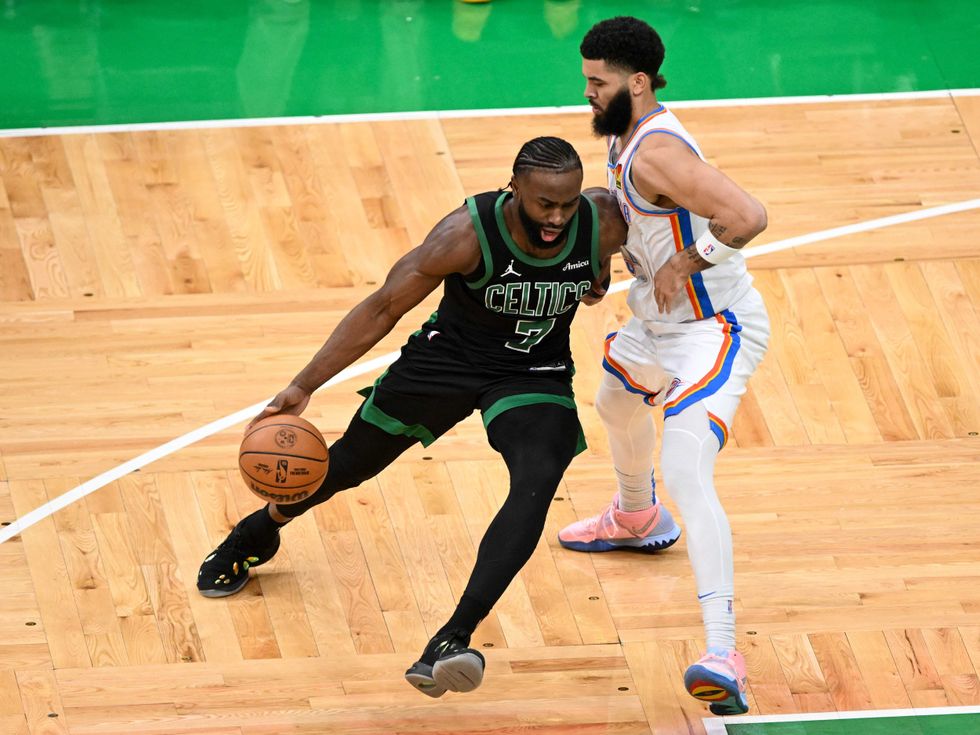 Jaylen Brown #7 of the Boston Celtics drives against Kenrich Williams #34 of the Oklahoma City Thunder during the second quarter at the TD Garden on March 12, 2025 in Boston, Massachusetts.