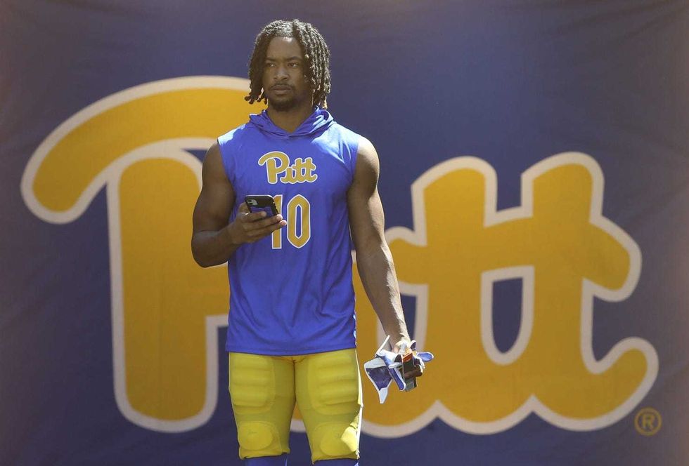 Jaylon Barden in front of script Pitt