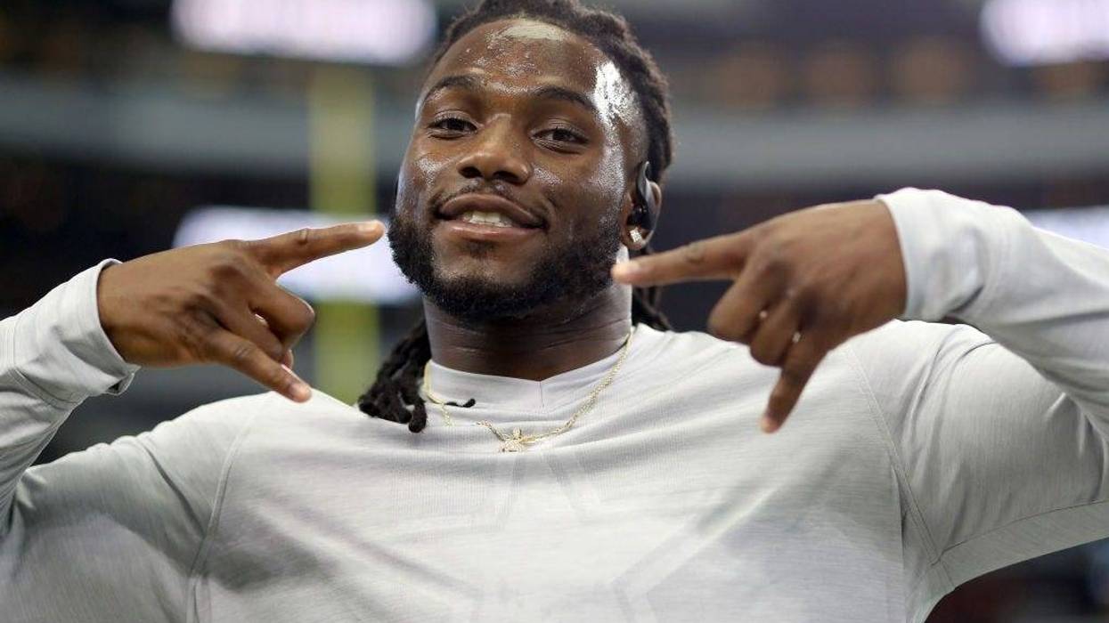 Jaylon Smith #54 of the Dallas Cowboys interacts with fans during pregame warmup before the Dallas Cowboys take on the Los Angeles Rams at AT&T Stadium on December 15, 2019 in Arlington, Texas.