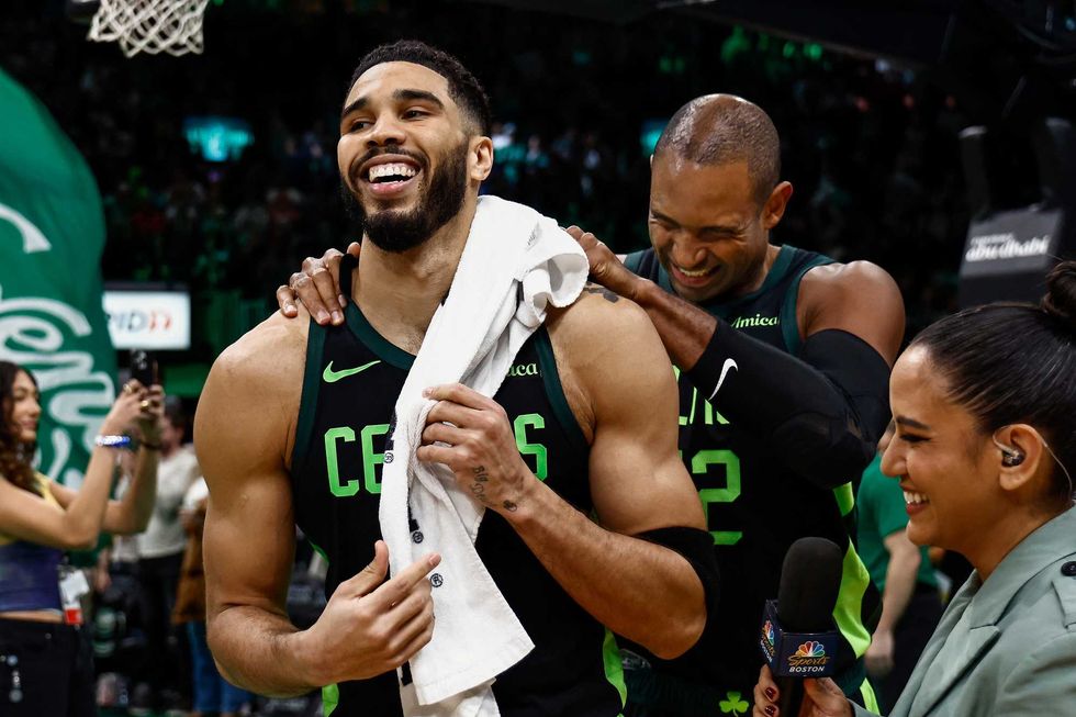 Jayson Tatum #0 of the Boston Celtics is congratulated by Al Horford #42 after his game winning shot at the end of overtime against the Toronto Raptors at TD Garden on November 16, 2024 in Boston, Massachusetts.