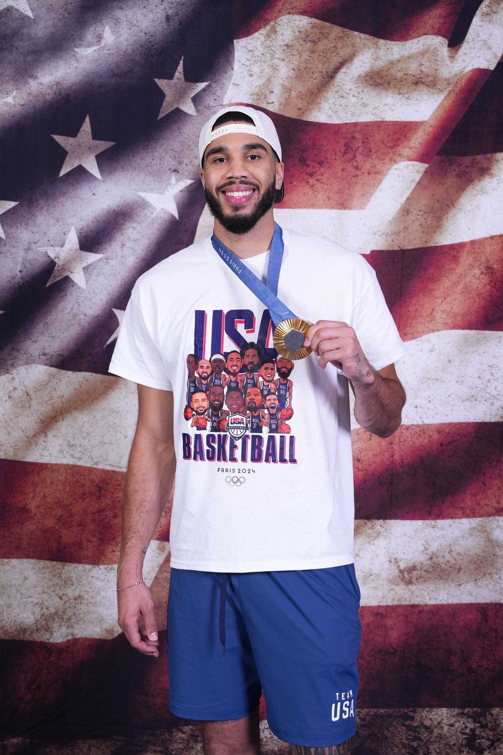 Jayson Tatum with his Olympic gold medal.