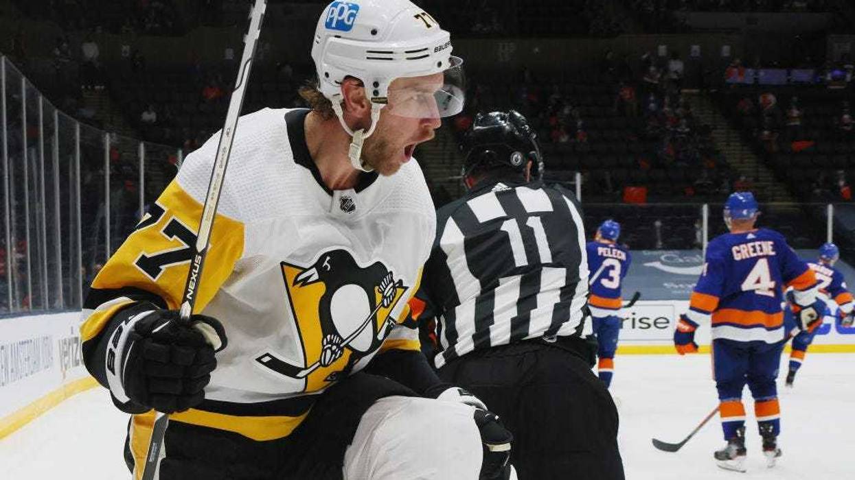 Jeff Carter #77 of the Pittsburgh Penguins scores in the third period on the powerplay against Semyon Varlamov #40 of the New York Islanders in Game Three of the First Round of the 2021 Stanley Cup Playoffs