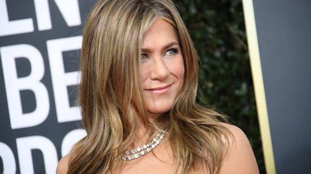 Jennifer Aniston arrives on the red carpet during the 77th Annual Golden Globe Awards at The Beverly Hilton Hotel