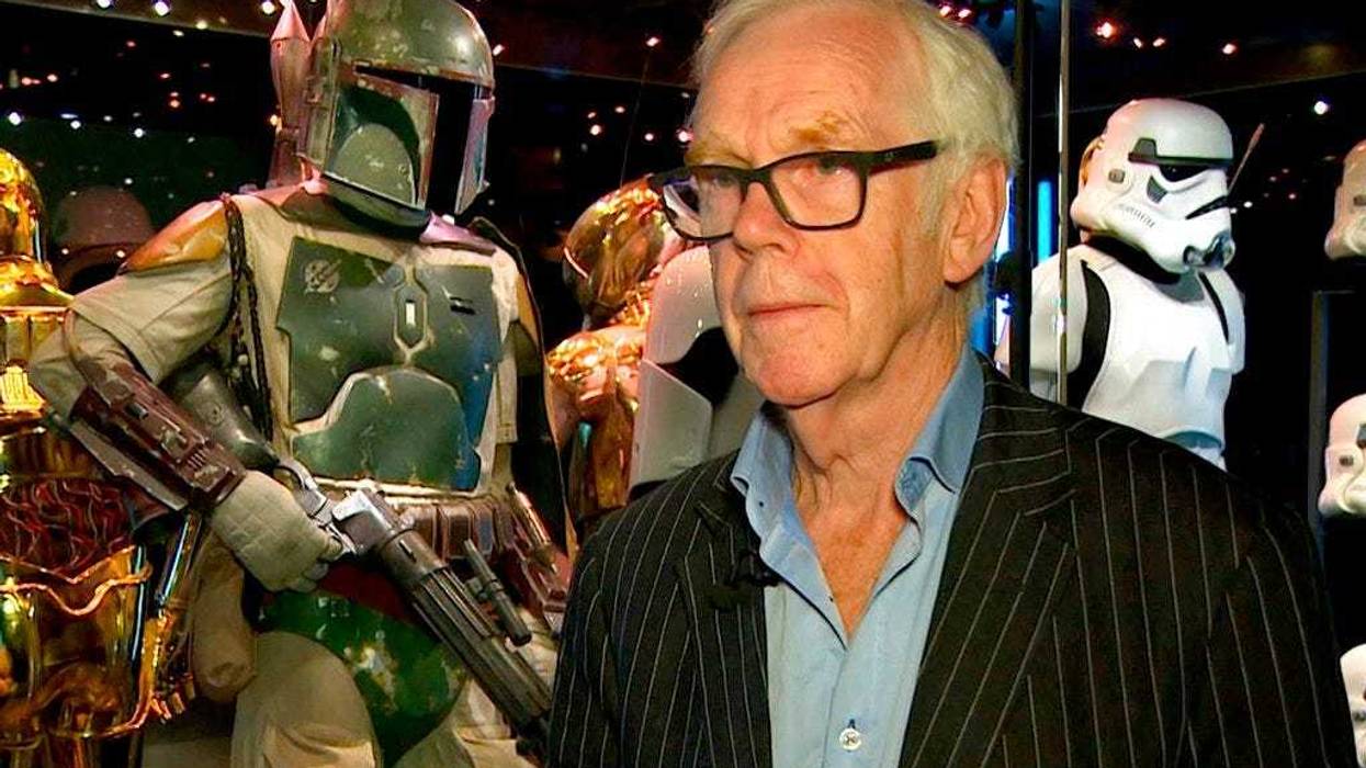 Jeremy Bulloch speaks in front of the costume he wore while playing Boba Fett in "Star Wars: Episode V – The Empire Strikes Back" and "Star Wars: Episode VI – Return of the Jedi" at the Star Wars Identities exhibition in London