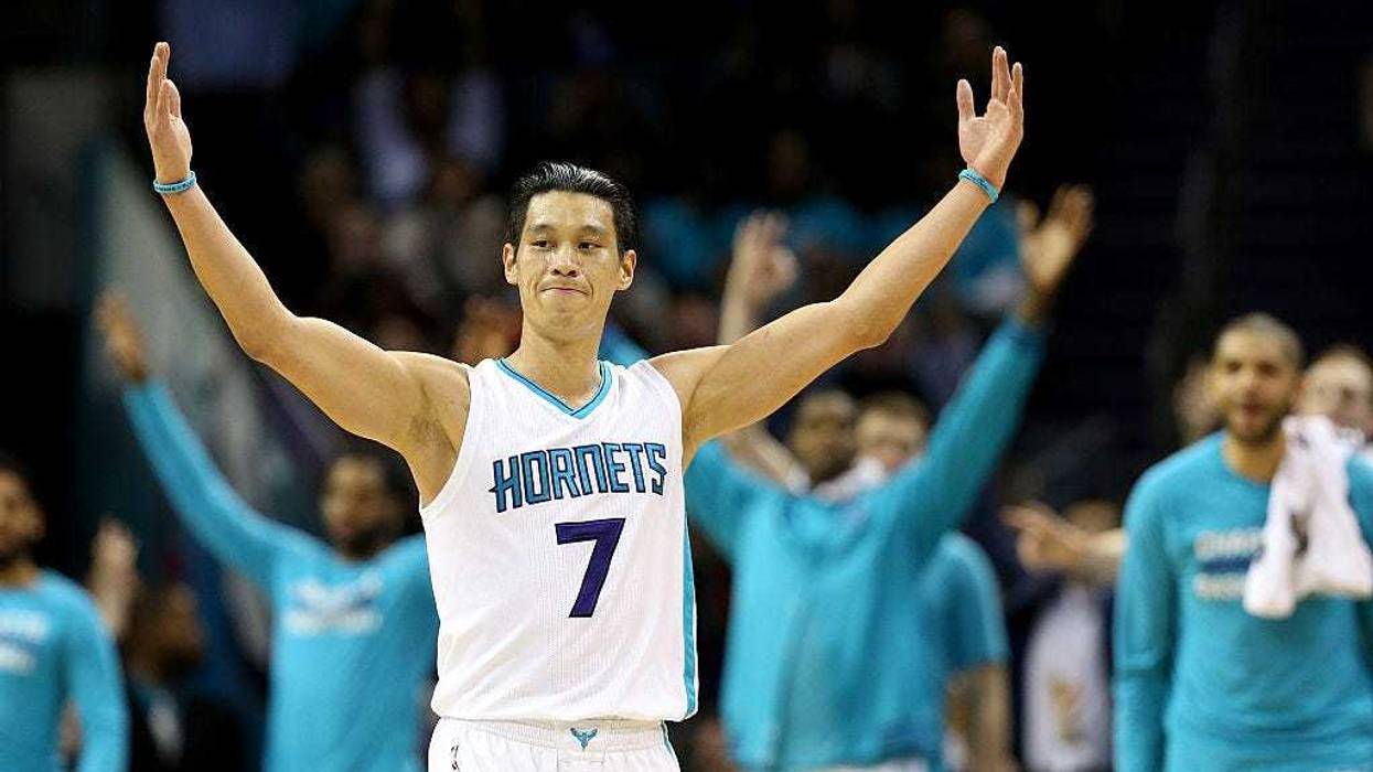 Jeremy Lin #7 of the Charlotte Hornets reacts after making a basket against the San Antonio Spurs during their game at Time Warner Cable Arena on March 21, 2016 in Charlotte, North Carolina.