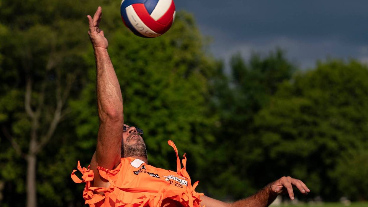 Jeremy Ramseyer serves the ball during a volleyball game at a Stonewall Sports competition in Indianapolis in 2022.