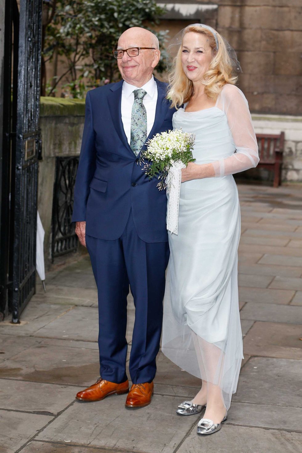 Jerry Hall and Rupert Murdoch are seen leaving St Bride