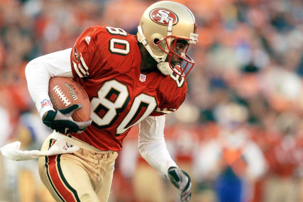 Jerry Rice plays for the 49ers int he Super Bowl