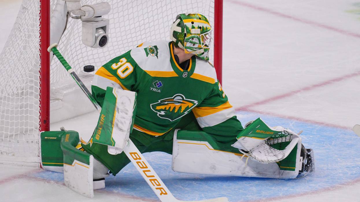 Jesper Wallstedt #30 of the Minnesota Wild is scored on by Sebastian Aho #20 (not pictured) of the Carolina Hurricanes in the third period at Grand Casino Arena on November 19, 2025 in St Paul, Minnesota.